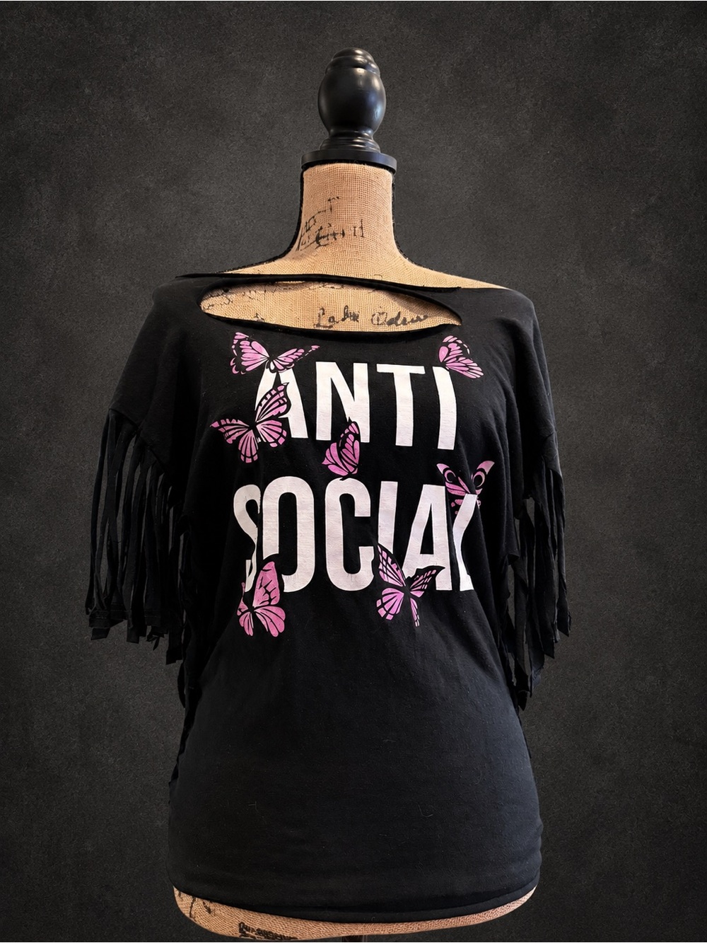 Black "ANTI SOCIAL" Fringe Tee with Pink Butterflies